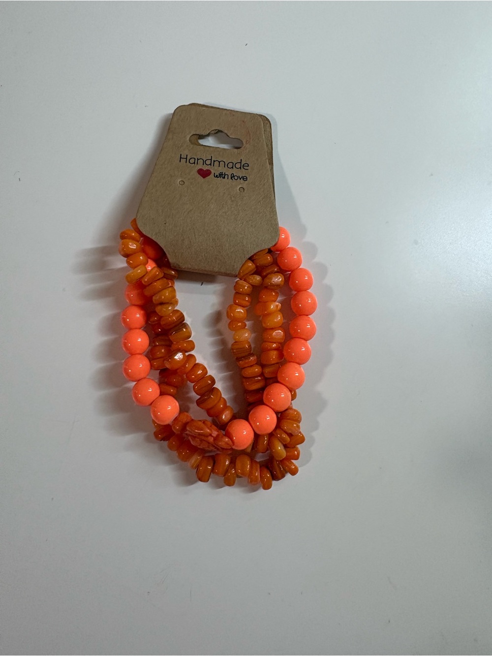 Orange Beaded Bracelets with turtle charm.